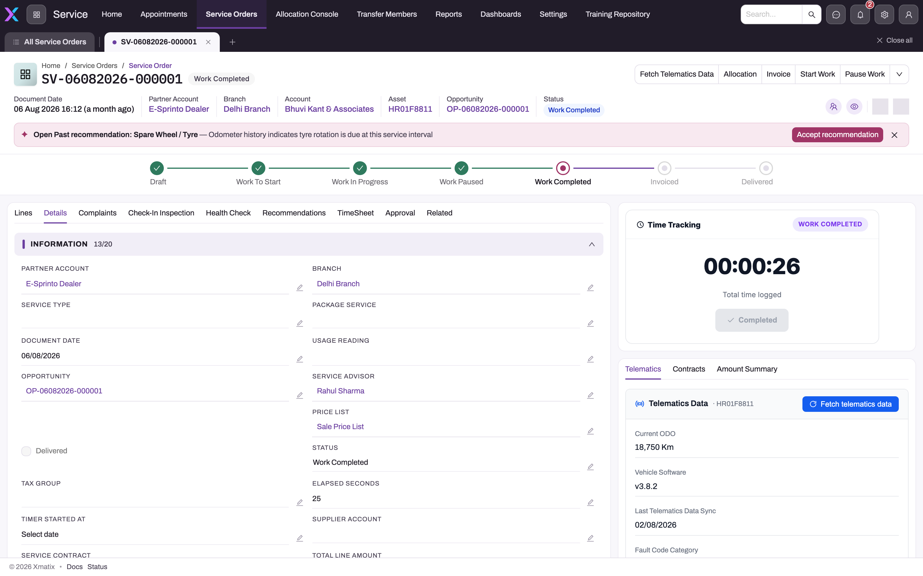 A saved service order in Work Completed status on the Details tab, showing the header actions, the status stepper from Draft to Delivered, the Information section and the Time Tracking and Telematics panels